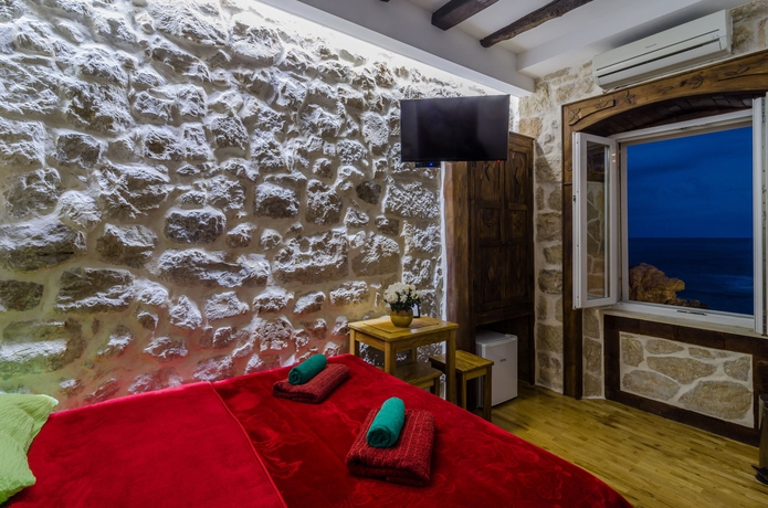 Imagen de la habitación del Hotel Eddie´s Sea View Rooms. Foto 4