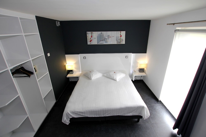 Imagen de la habitación del Hotel Eden Ardenne. Foto 9