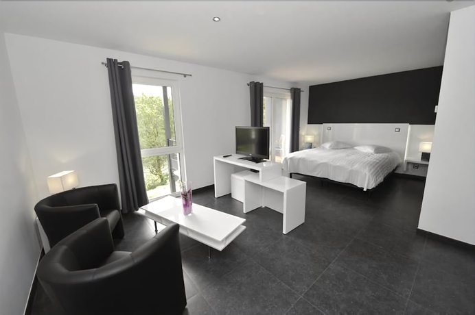 Imagen de la habitación del Hotel Eden Ardenne. Foto 11