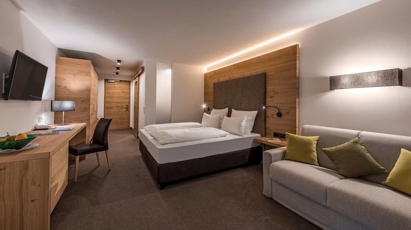 Imagen de la habitación del Hotel Eden Boutique, Curon Venosta. Foto 12