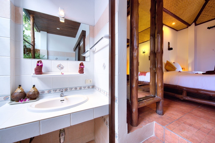 Imagen de la habitación del Hotel Eden Bungalows. Foto 6