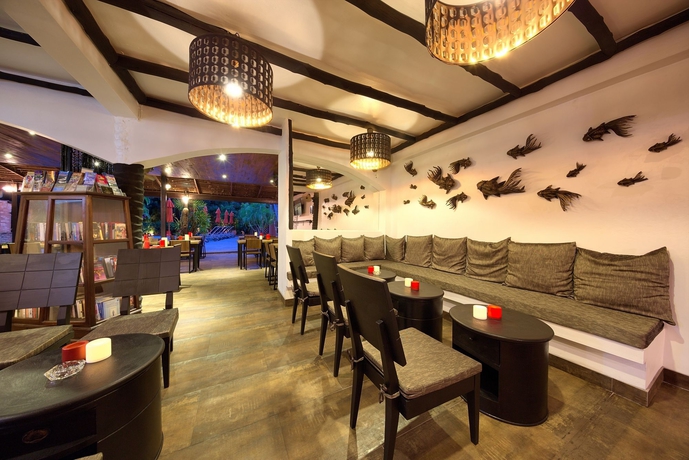Imagen del bar/restaurante del Hotel Eden Bungalows. Foto 3