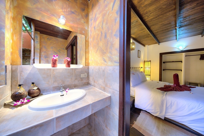 Imagen de la habitación del Hotel Eden Bungalows. Foto 15