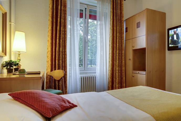 Imagen de la habitación del Hotel Eden Genève. Foto 5