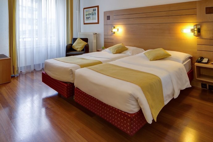 Imagen de la habitación del Hotel Eden Genève. Foto 11