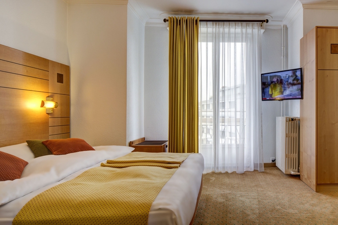 Imagen de la habitación del Hotel Eden Genève. Foto 12