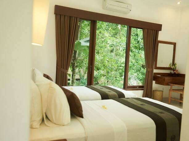 Imagen de la habitación del Hotel Eden House Ubud. Foto 22
