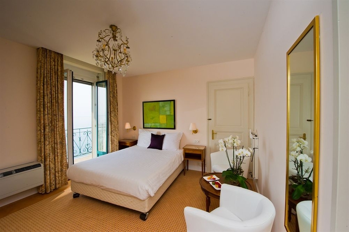 Imagen de la habitación del Hotel Eden Palace Au Lac. Foto 3