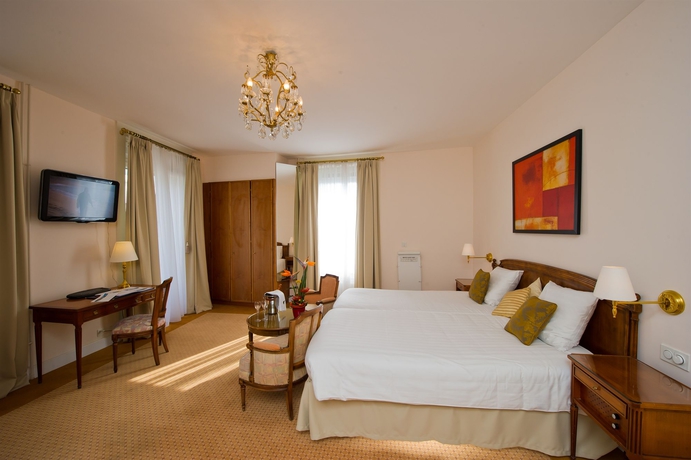 Imagen de la habitación del Hotel Eden Palace Au Lac. Foto 7