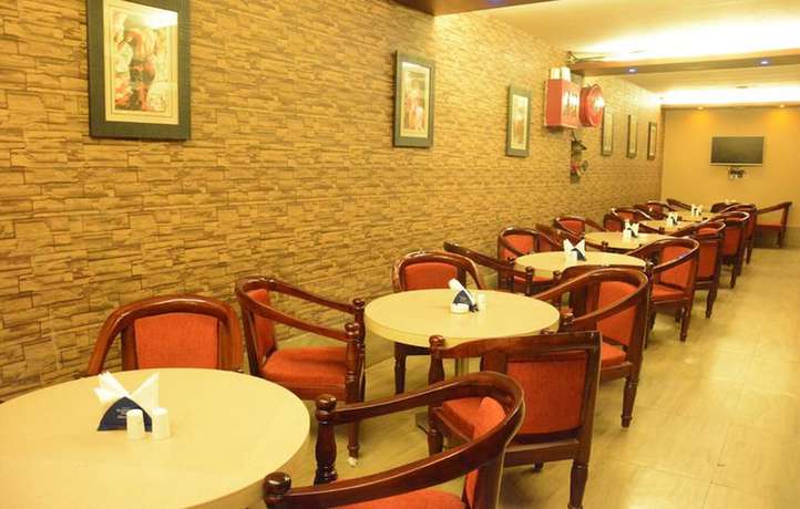 Imagen del bar/restaurante del Hotel Eden Roc, Bhubaneswar. Foto 7