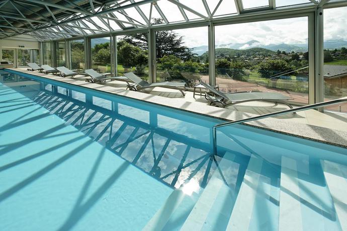 Imagen de la piscina del Hotel Eden Spiez. Foto 19