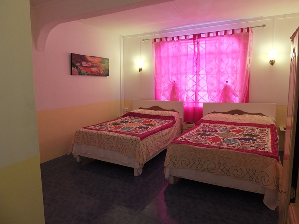 Imagen de la habitación del Hotel Eden Villa. Foto 10