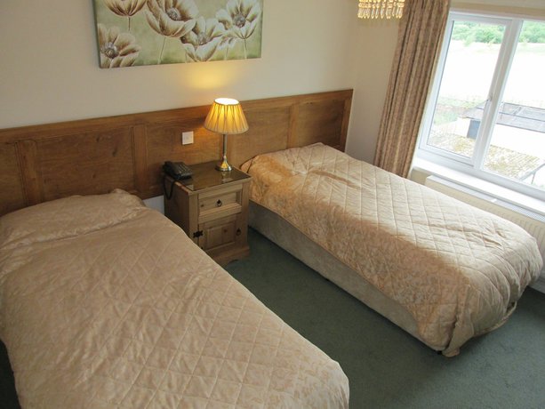 Imagen de la habitación del Hotel Edenhall Country House. Foto 4