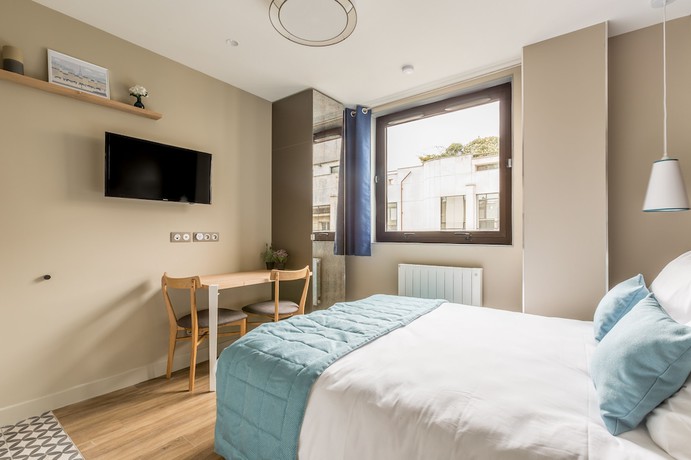 Imagen de la habitación del Hotel Edgar Suites Expo Paris Porte de Versailles. Foto 4