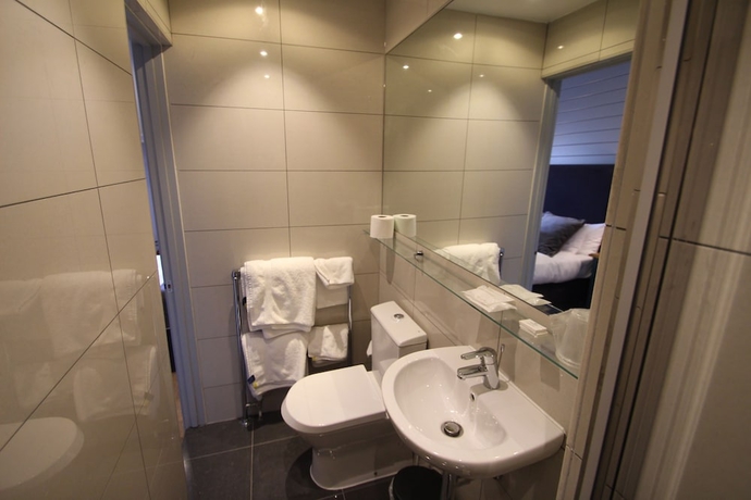 Imagen de la habitación del Hotel Edgar Townhouse. Foto 16