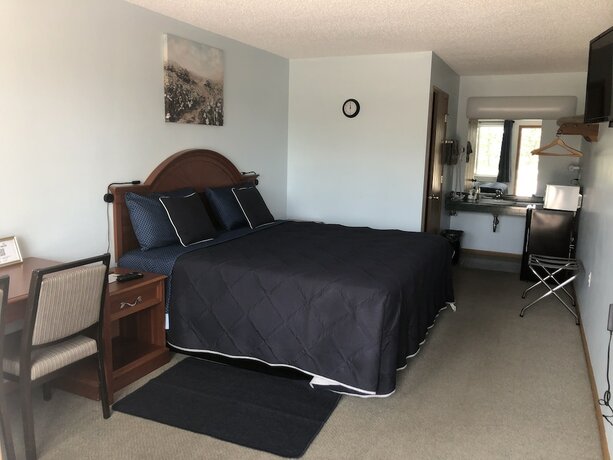 Imagen de la habitación del Hotel Edge Of The Woods Motel. Foto 19