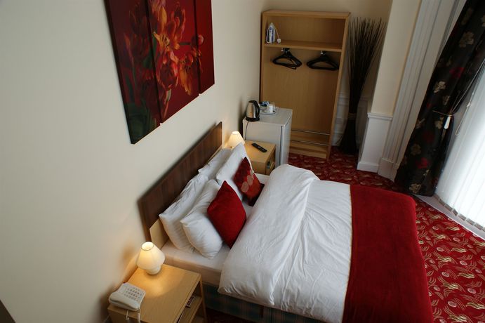 Imagen de la habitación del Hotel Edgerton Guest House. Foto 12