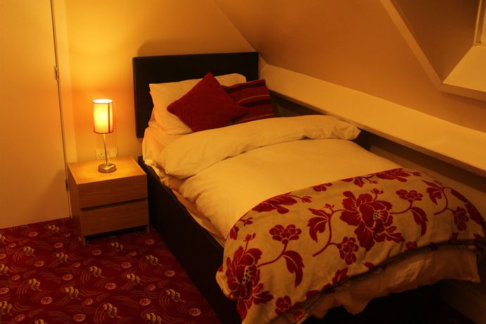 Imagen de la habitación del Hotel Edgerton Guest House. Foto 13