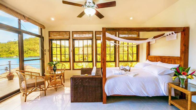 Imagen de la habitación del Hotel Edgewater Dive and Spa Resort. Foto 4