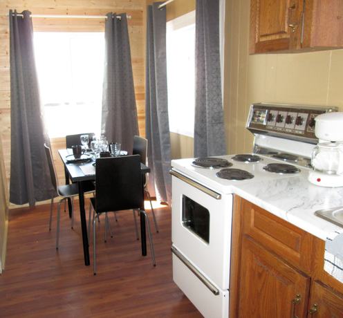 Imagen de la habitación del Hotel Edgewater Resorts - Edgewater Cottages. Foto 5