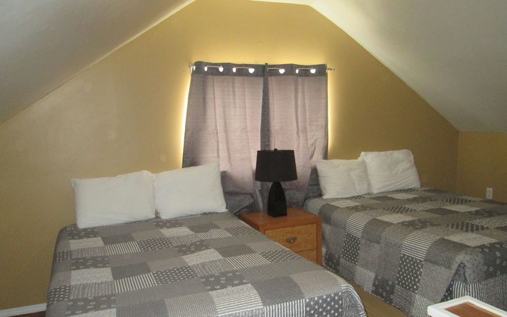 Imagen de la habitación del Hotel Edgewater Resorts - Edgewater Cottages. Foto 11