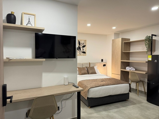 Imagen de la habitación del Hotel Edificio OA Aparta-suites. Foto 6