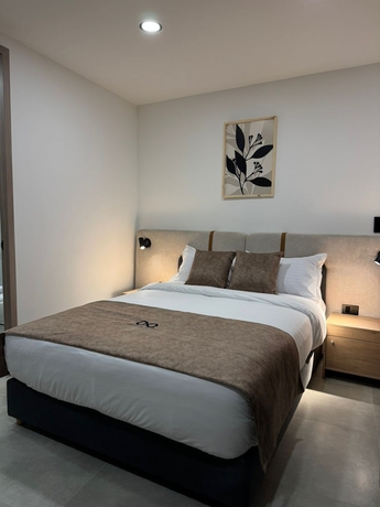 Imagen de la habitación del Hotel Edificio OA Aparta-suites. Foto 7