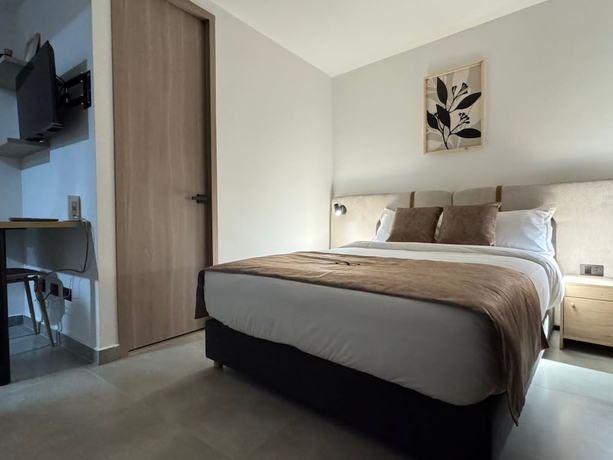 Imagen de la habitación del Hotel Edificio OA Aparta-suites. Foto 8