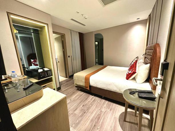 Imagen de la habitación del Hotel Edition Old City. Foto 8