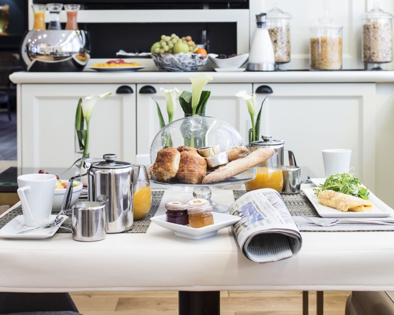 Imagen de la habitación del Hotel Edouard 7 Paris Opéra. Foto 8