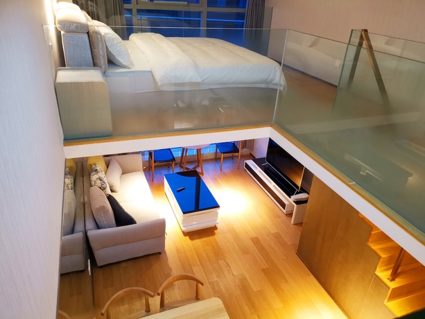 Imagen de la habitación del Hotel Efc Qingchengli Loft Apartment. Foto 2