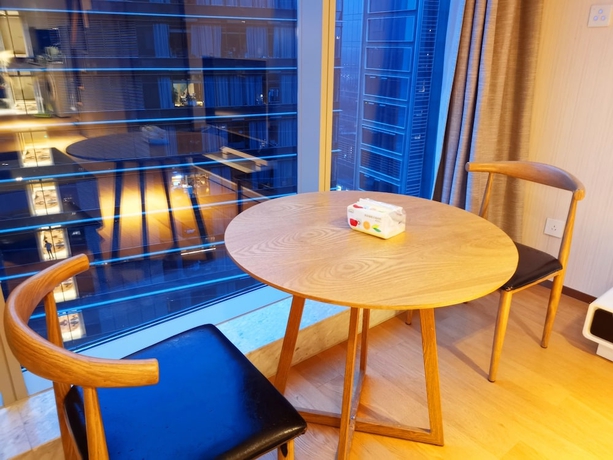 Imagen de la habitación del Hotel Efc Qingchengli Loft Apartment. Foto 3