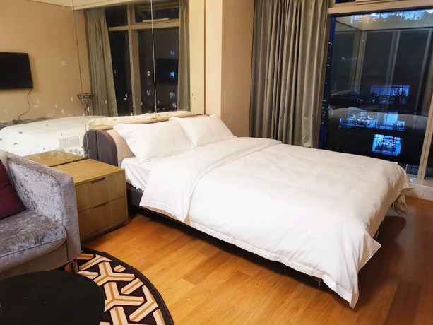 Imagen de la habitación del Hotel Efc Qingchengli Loft Apartment. Foto 7