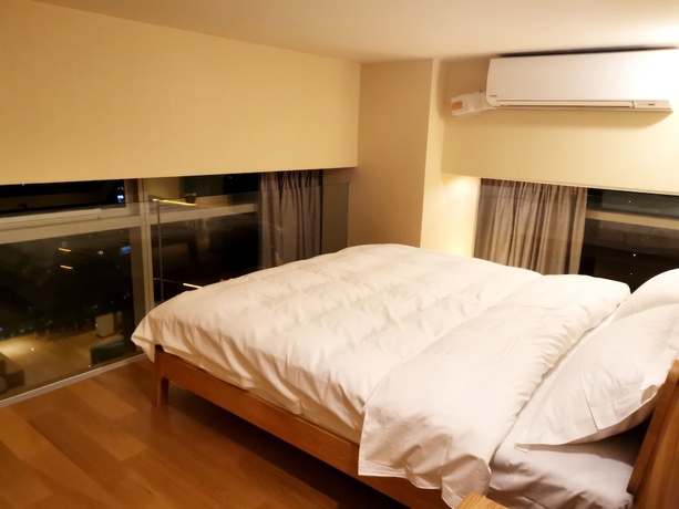 Imagen de la habitación del Hotel Efc Qingchengli Loft Apartment. Foto 8