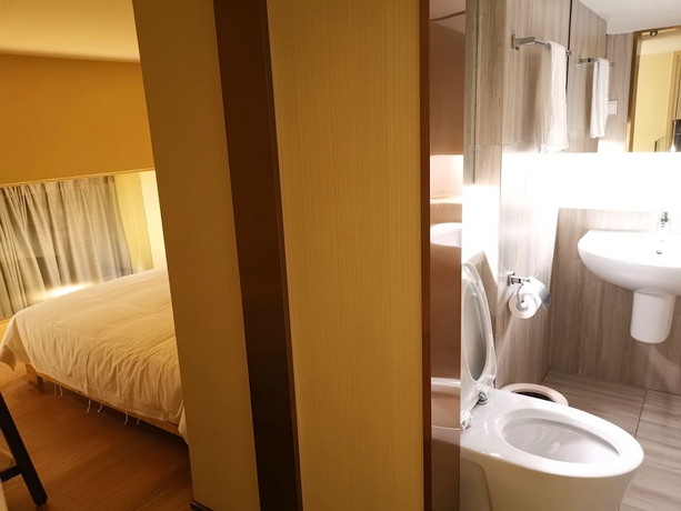 Imagen de la habitación del Hotel Efc Qingchengli Loft Apartment. Foto 10