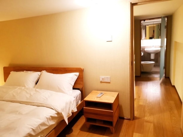 Imagen de la habitación del Hotel Efc Qingchengli Loft Apartment. Foto 12