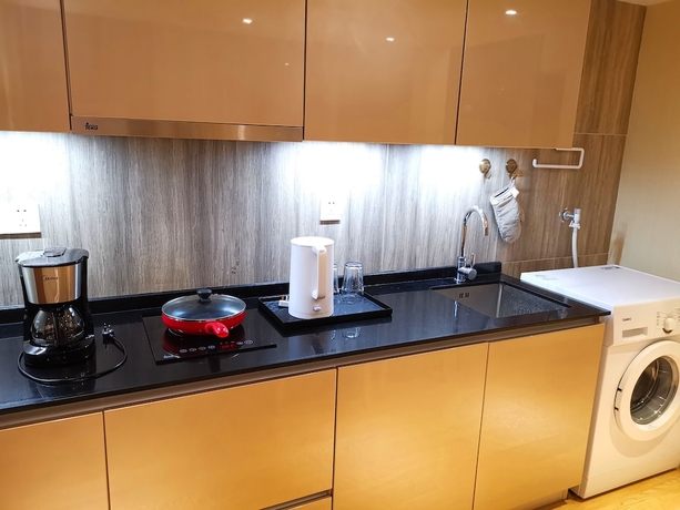 Imagen de la habitación del Hotel Efc Qingchengli Loft Apartment. Foto 15