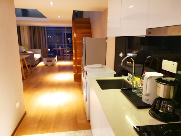 Imagen de la habitación del Hotel Efc Qingchengli Loft Apartment. Foto 16