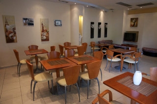 Imagen del bar/restaurante del Hotel Efstratios Hotel. Foto 3