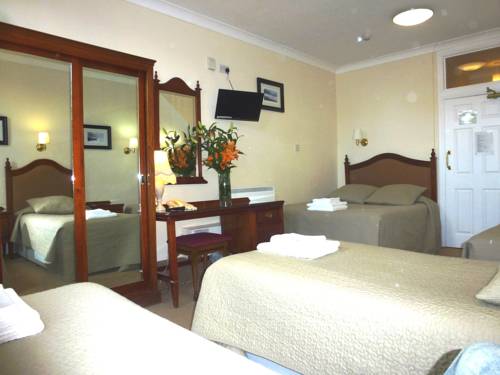 Imagen de la habitación del Hotel Egans Guest House. Foto 5