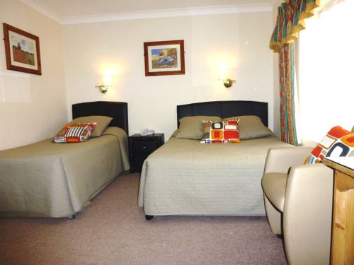 Imagen de la habitación del Hotel Egans Guest House. Foto 13