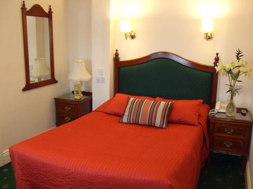 Imagen de la habitación del Hotel Egans Guest House. Foto 14