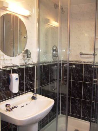 Imagen de la habitación del Hotel Egans Guest House. Foto 15