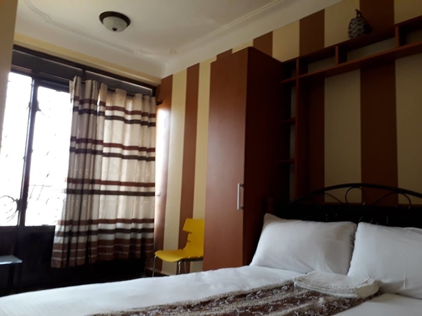 Imagen de la habitación del Hotel Egret Pilgrims Inn. Foto 11