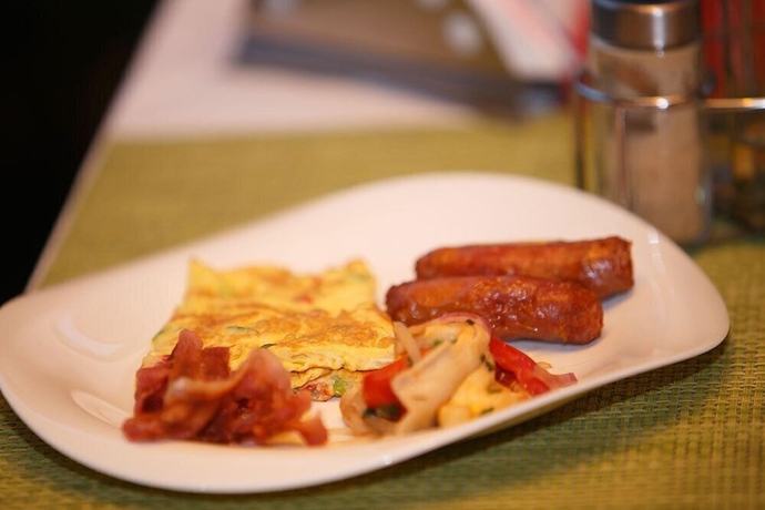 Imagen del bar/restaurante del Hotel Egret Pilgrims Inn. Foto 6