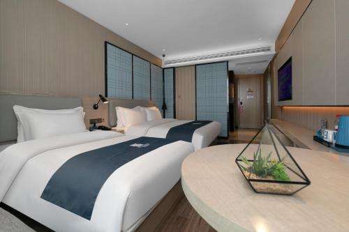 Imagen general del Hotel Eharm Jingzhou Olympic Sports Center. Foto 1