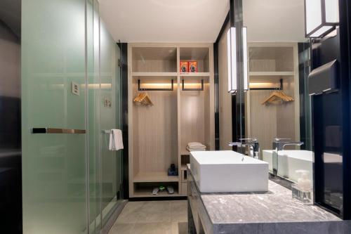 Imagen general del Hotel Eharm Jingzhou Olympic Sports Center. Foto 12