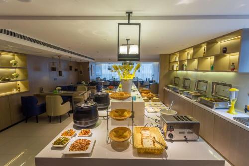 Imagen general del Hotel Eharm - Wuhan Optics Valley Pedestrian Street Huake University. Foto 3