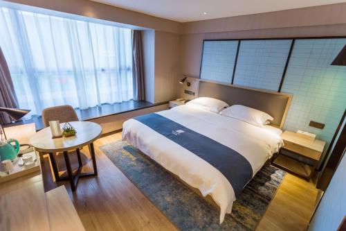 Imagen de la habitación del Hotel Eharm - Wuhan Optics Valley Pedestrian Street Huake University. Foto 20