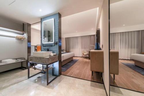 Imagen general del Hotel Eharm Wuhan Optics Valley University Park Road. Foto 3